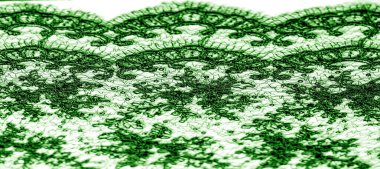 Doku, desen, beyaz bir arka plan üzerinde yeşil dantel kumaş. Th