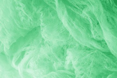 Örgü yeşilli kumaş. Sizin için ruhani parlaklık bir çizgi ekleyin