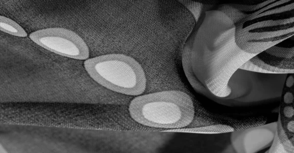 Текстура, фон, узор, обои. Чёрно-белая шелковая ткань — стоковое фото