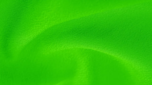 Diaper fabric with green texture. This versatile fabric has many — Stock Photo, Image