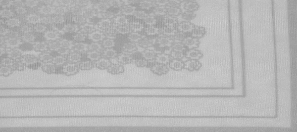Textuur patroon, zwarte grijze zijde stof op een witte achtergrond, f — Stockfoto