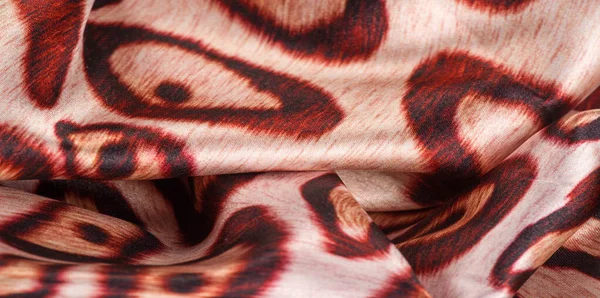 Tekstura, tło, wzór. Tkanina jedwabna, skóra tygrysa, lekki i — Zdjęcie stockowe