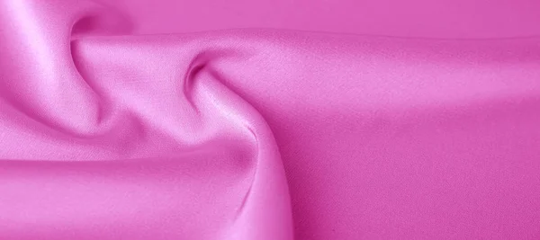Tekstury. Różowa tkanina jedwabna. genialny połysk i charakterystyczny — Zdjęcie stockowe