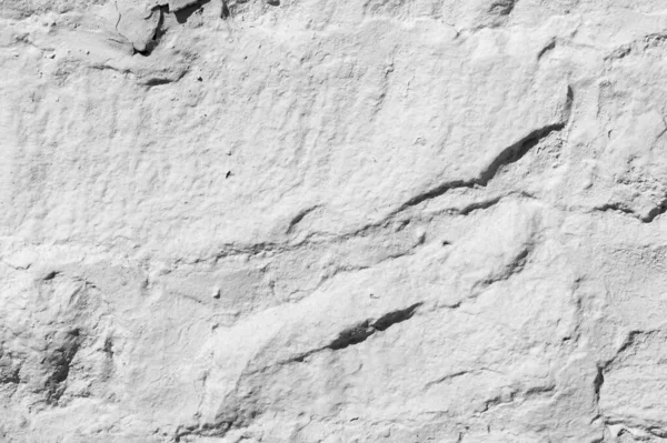 Текстура тла, візерунок. Стіна облицьована гранітним каменем — стокове фото