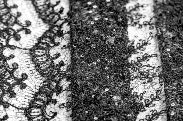 Texture, motif, tissu dentelle en noir sur fond blanc. Th h — Photo