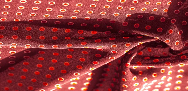 Textur bakgrund, mönster, rött sidentyg med röda prickar — Stockfoto