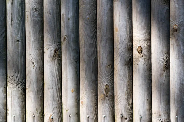 Texture, sfondo, pattern. Recinzione di barre di legno, non dipinte , — Foto Stock