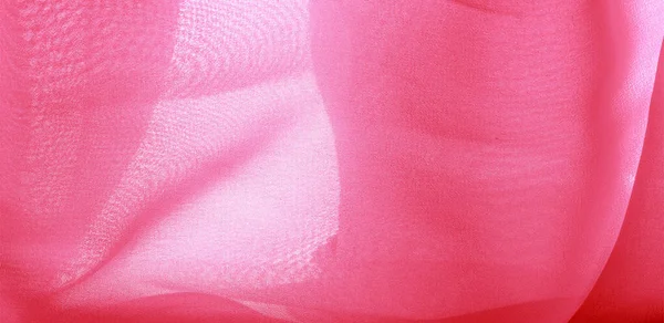 Текстура фона. Красная шелковая ткань с тонким матовым покрытием — стоковое фото