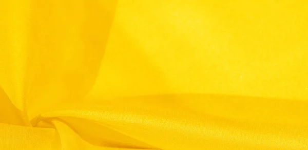 Texture, sfondo, motivo, tessuto di seta in giallo. Questa seta i — Foto Stock