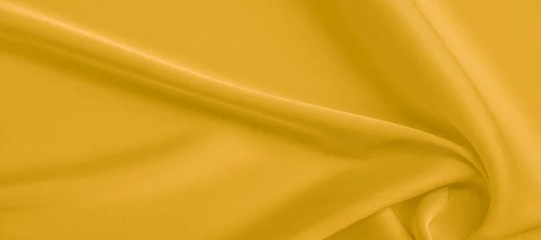 Tekstur latar belakang, pola. Kain sutra kuning. Sebuah fa sangat ringan — Stok Foto