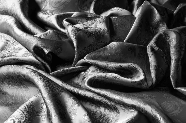 Texture, background, black steel gray fabric with a paisley patt — Stock Photo, Image