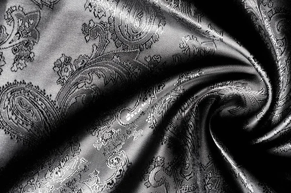 Textura, fundo, tecido cinza de aço preto com um patt paisley — Fotografia de Stock