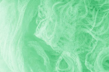 Örgü yeşilli kumaş. Sizin için ruhani parlaklık bir çizgi ekleyin