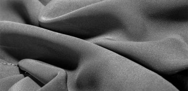 İpek kumaş Arka plan dokusu. Bu doğal siyah bir atkı.