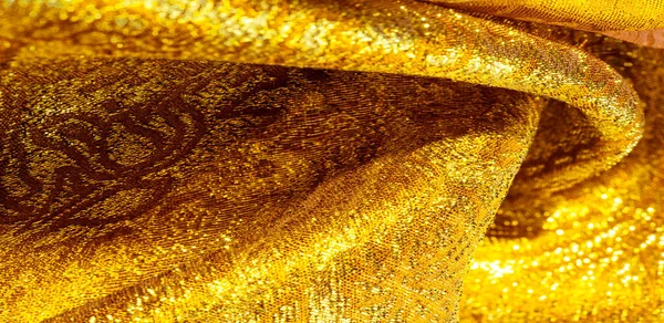 Textuur achtergrond, patroon. stof geel goud Brocade. Organz — Stockfoto