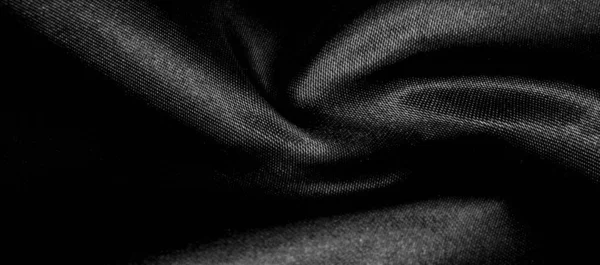 Texture, background, pattern. Black silk fabric. It is black and — Stock Photo, Image