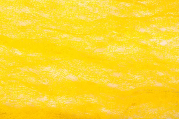 Textúra háttér, mintázat. Hálós sárga szövet. Ideális accen — Stock Fotó