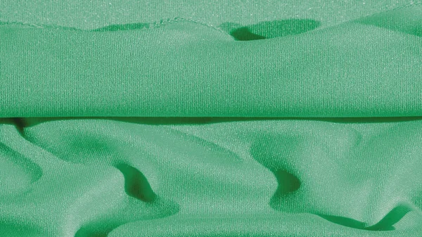 Textura, fundo, tecido de seda, xale de mulher verde Conveniente — Fotografia de Stock