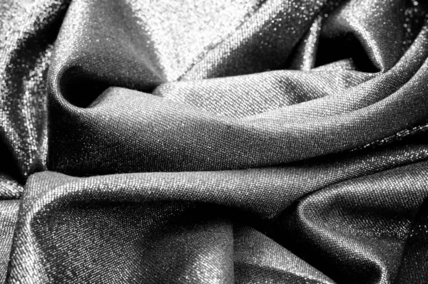 Текстура, фон, рисунок. Ткань серая с черным покрытием — стоковое фото