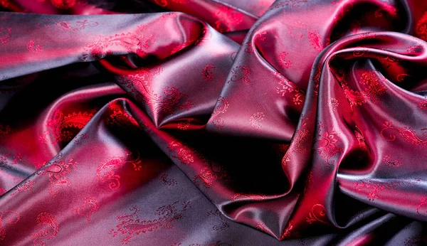 Textura, tela, seda roja con patrón paisley. Esta hermosa p —  Fotos de Stock