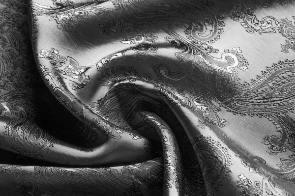 Tekstur, latar belakang, baja hitam abu-abu kain dengan patt paisley — Stok Foto