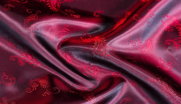 Текстура, тканина, червоний шовк з візерунком пейслі. Цей красивий p Ліцензійні Стокові Зображення