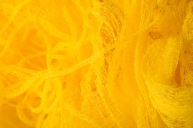 Doku arka planı, desen. Örgü sarı kumaş. Accen için ideal