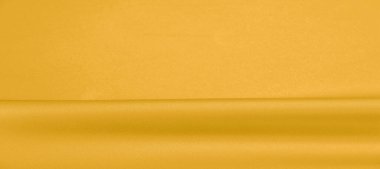 arka plan dokusu, desen. Sarı ipek kumaş. Çok hafif bir fa