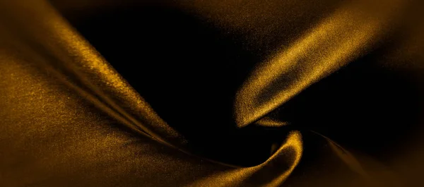 Texture, fond, motif. Panorama tissu soie jaune doré — Photo