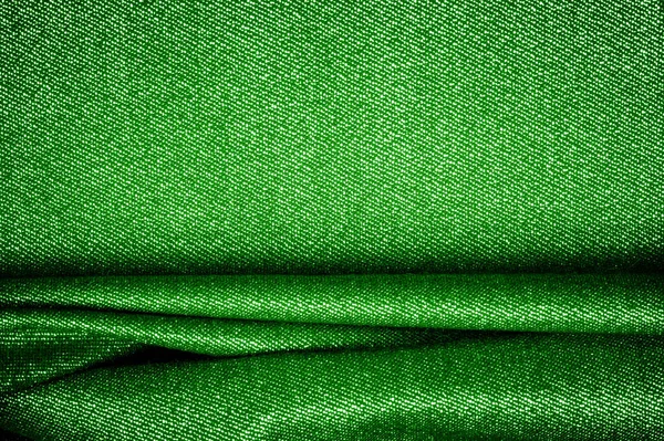 Texture, fond, motif. Le tissu est vert foncé enduit wi — Photo