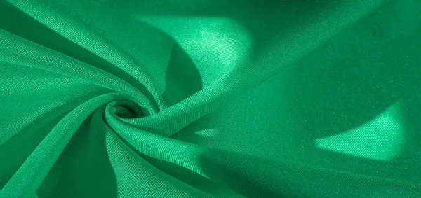 Tekstur, kain sutra warna hijau, sati sutra hijau muda padat — Stok Foto