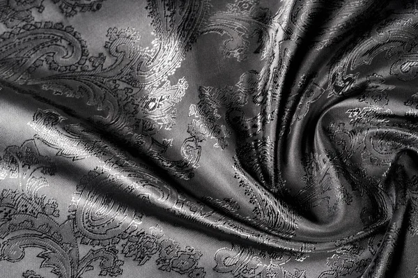 Texture, fond, tissu gris acier noir avec une patte paisley — Photo