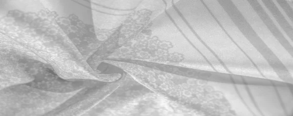 Texturmuster, schwarz-grauer Seidenstoff auf weißem Hintergrund, — Stockfoto