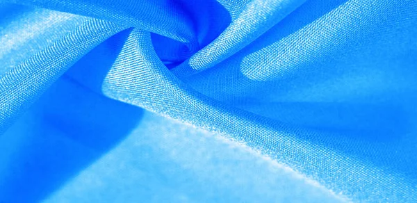 Tekstur, latar belakang, pola, kain sutra berwarna biru. Sutra ini adalah — Stok Foto
