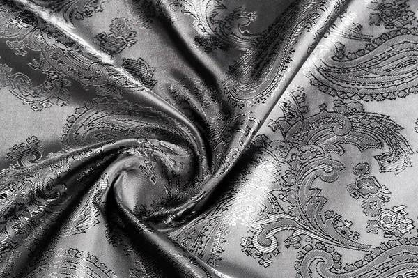 Textura, fundo, tecido cinza de aço preto com um patt paisley — Fotografia de Stock