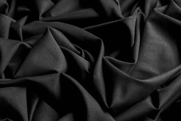 Strukturierte Hintergrundpläne, schwarzer Stoff. dieses leichte Gewebe von li — Stockfoto