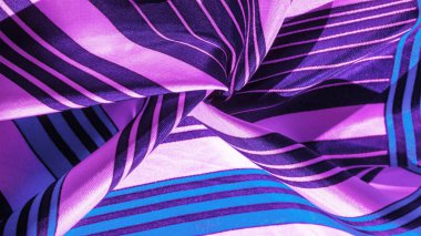 Doku, arka plan, mavi çizgili desenli ipek kumaş. Th