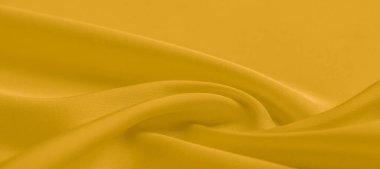 arka plan dokusu, desen. Sarı ipek kumaş. Çok hafif bir fa