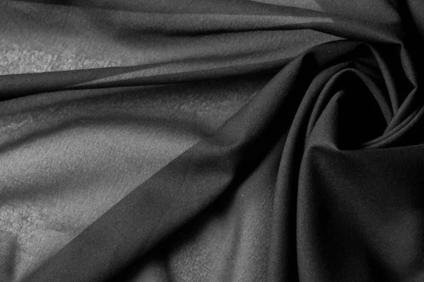 Текстурированные фоновые планы, черная ткань. Эта светлая ткань Ли — стоковое фото