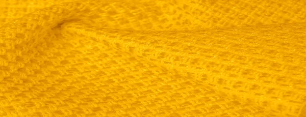 Фоновая текстура, узор. Желтая ткань с металлическими блестками — стоковое фото