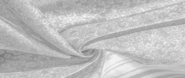 Texturmuster, schwarz-grauer Seidenstoff auf weißem Hintergrund, — Stockfoto