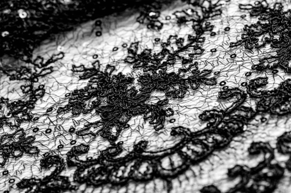 Textura, patrón, tela de encaje en negro sobre un fondo blanco. Th — Foto de Stock