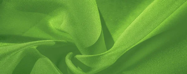 Textura, fondo, patrón, tela verde seda. Crepe satén en — Foto de Stock