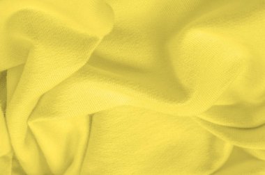 Doku arka plan deseni. Örme kumaş Sarı. Batma, xan