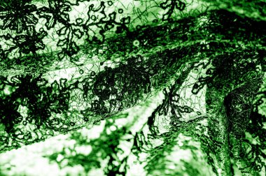 Doku, desen, beyaz bir arka plan üzerinde yeşil dantel kumaş. Th