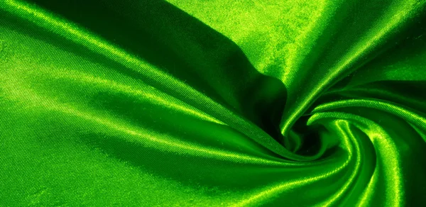 Tekstura, tło, wzór, jedwabna tkanina w kolorze zielonym. Jest to — Zdjęcie stockowe