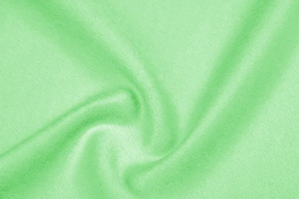纹理，背景，图案。布暖羊毛是绿色的，厚厚的 — 图库照片
