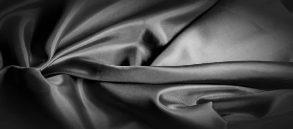 Texture, background, pattern. Black silk fabric. It is black and — Stock Photo, Image