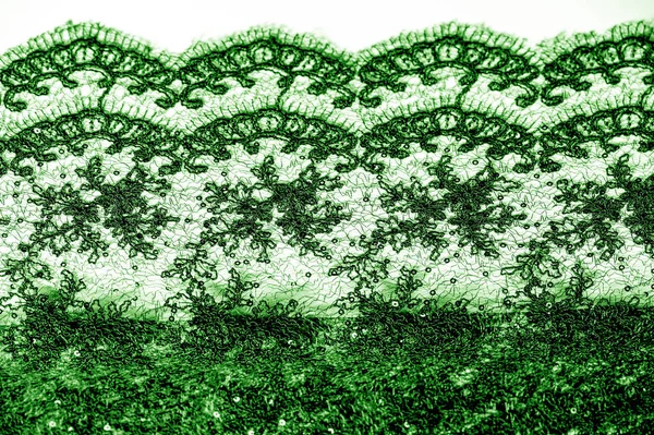 Texture, pattern, lace fabric in green on a white background. Th — Stock Photo, Image