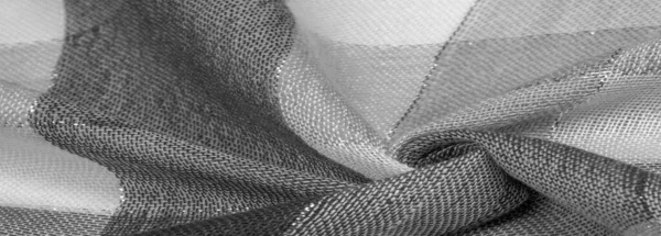 Текстура, фон, шовковий шарф жіночий чорно-білий з — стокове фото